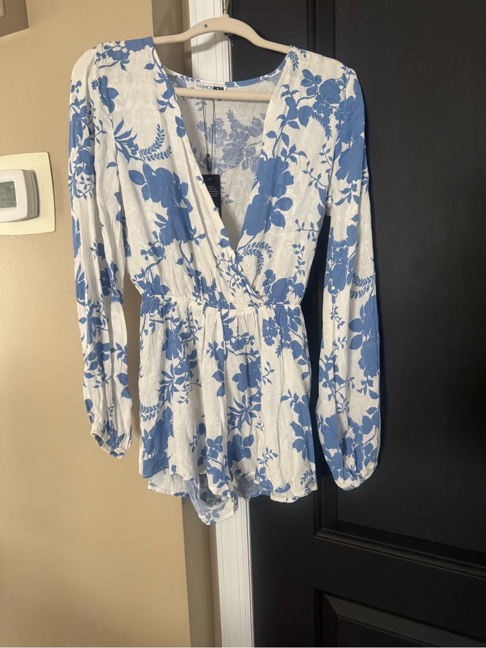 Fashion Nova Blue & White Floral Wrap Romper